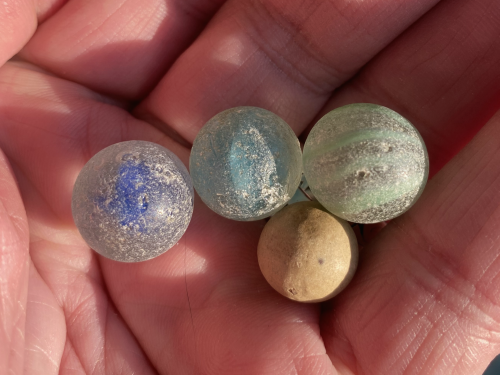 Creek marbles - 1 clay.png