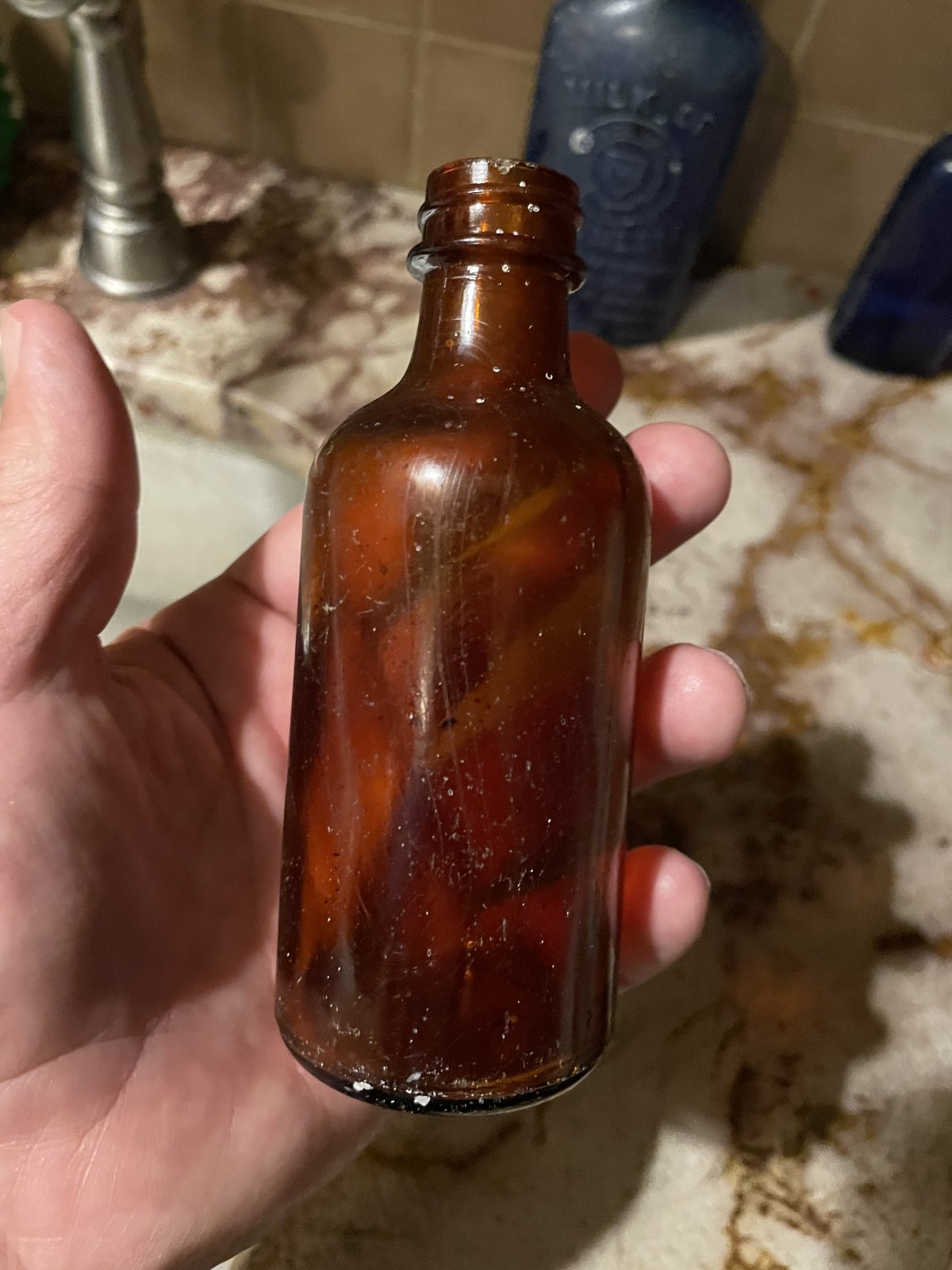 small brown bottle front.jpeg