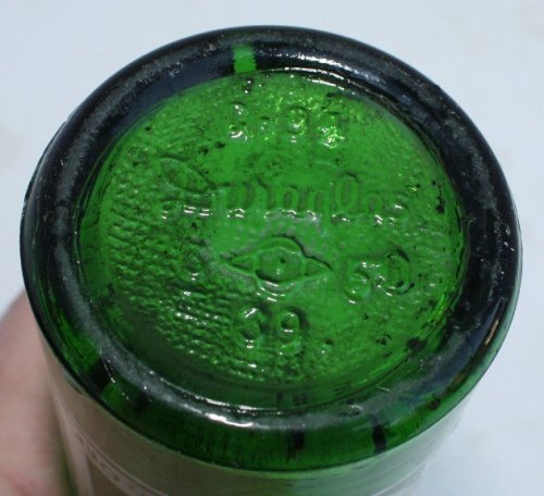 7up Bottle Base With Date Code Number Changed From 1945 to 1950.jpg