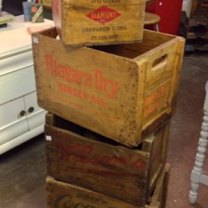 Among 3 other crates, a medium Niagara Dry crate with orange lettering