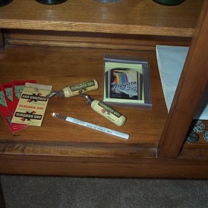 Various Niagara Dry products, including a matchbook, two bottle openers, original unused paper labels, 3 Cross of Honour slips and an unidentified white slim object.