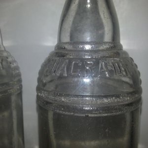 Top portion of bottle reads "NIAGRA-DRY" on one side, and "NIAGRA-DRY" with "REGISTERED" underneath on the opposite side