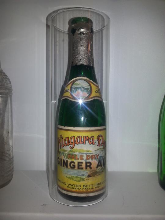 An incredibly rare Niagara Dry bottle. I've only seen two, and the other one was missing the foil on the top.