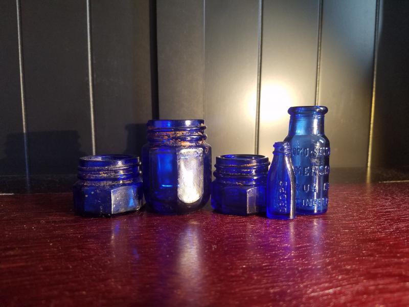 Noxema jars, a Vicks Drops, and a small Bromo Seltzer