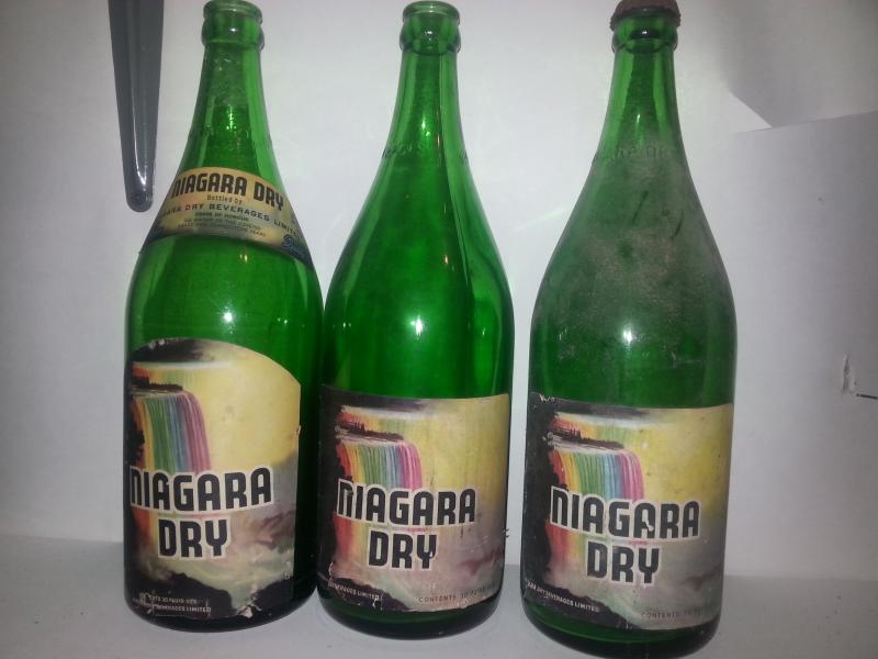 Some rainbow falls paper label variants of 30oz bottles.